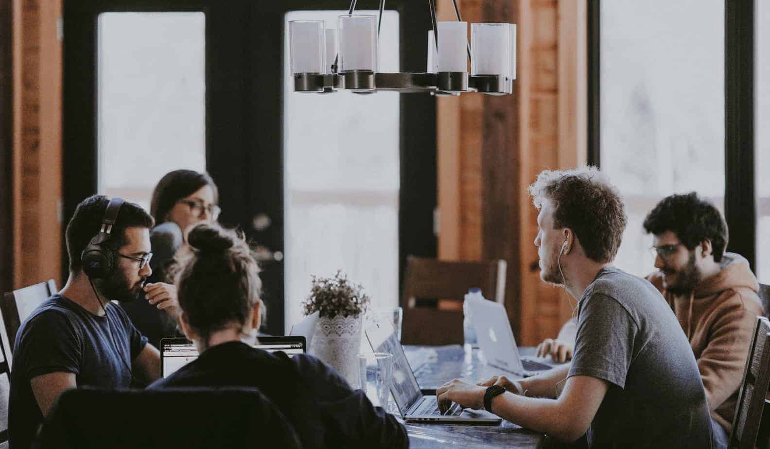 people talking around a table