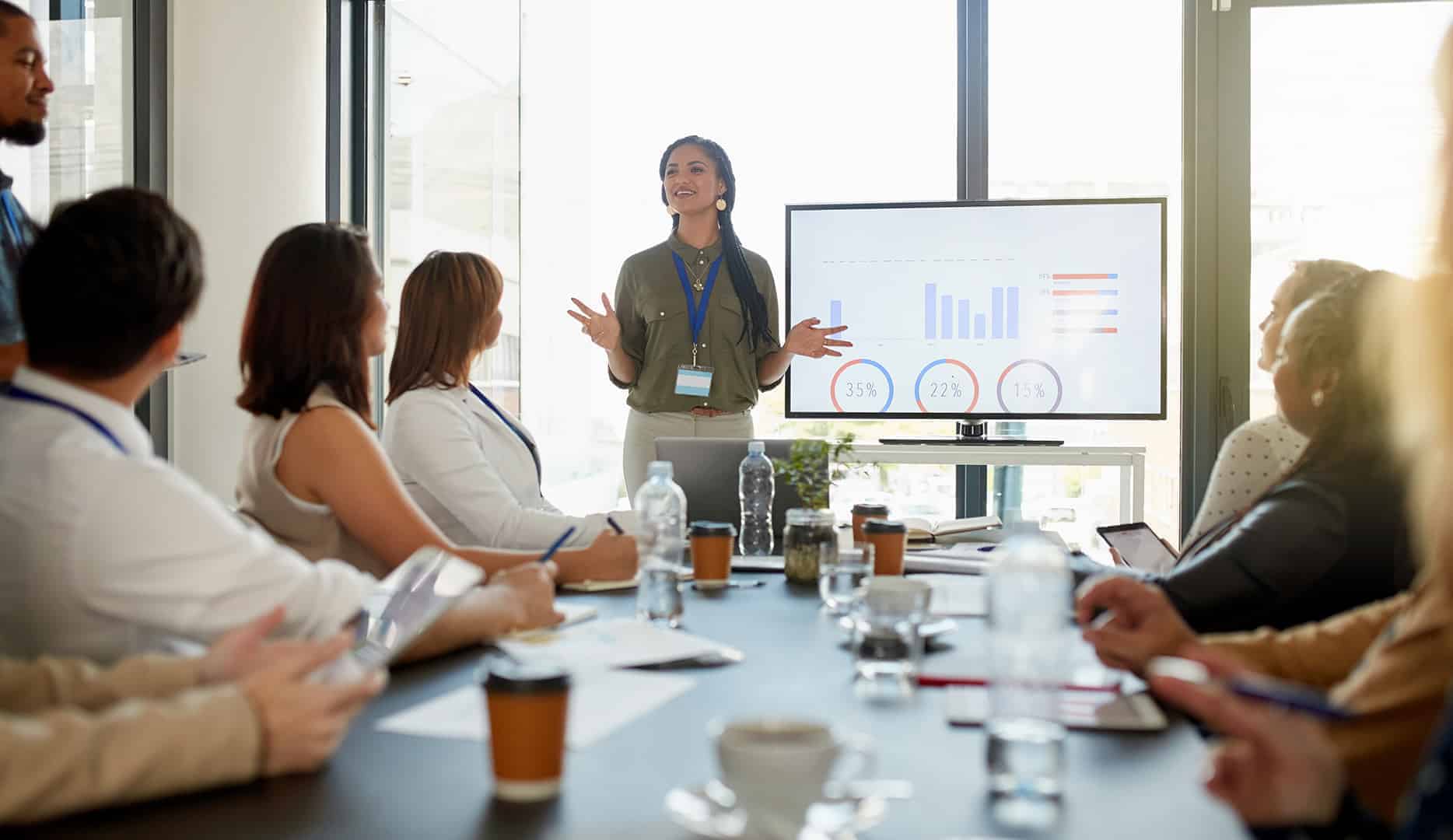 Business meeting with woman presenting