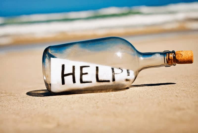 message in a bottle on a beach