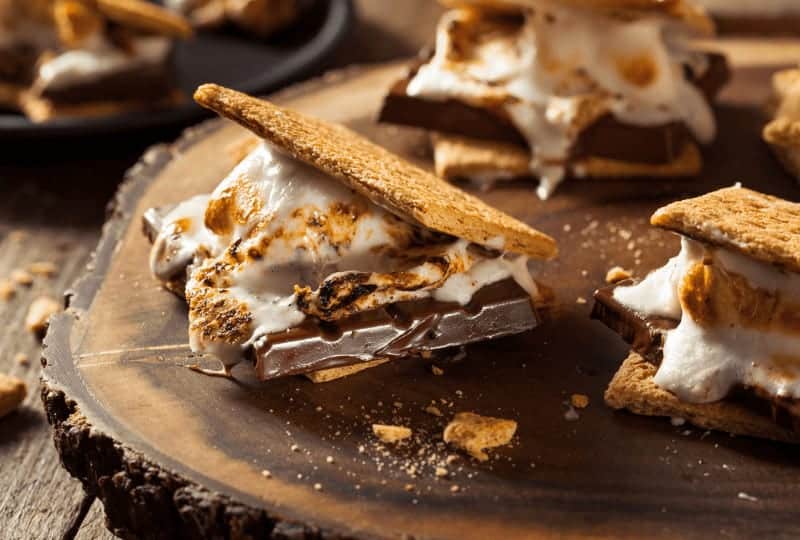 s'mores on a wooden stump