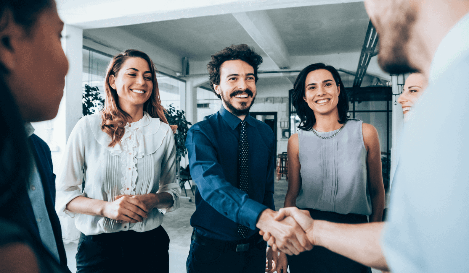 business meeting introduction by shaking hands