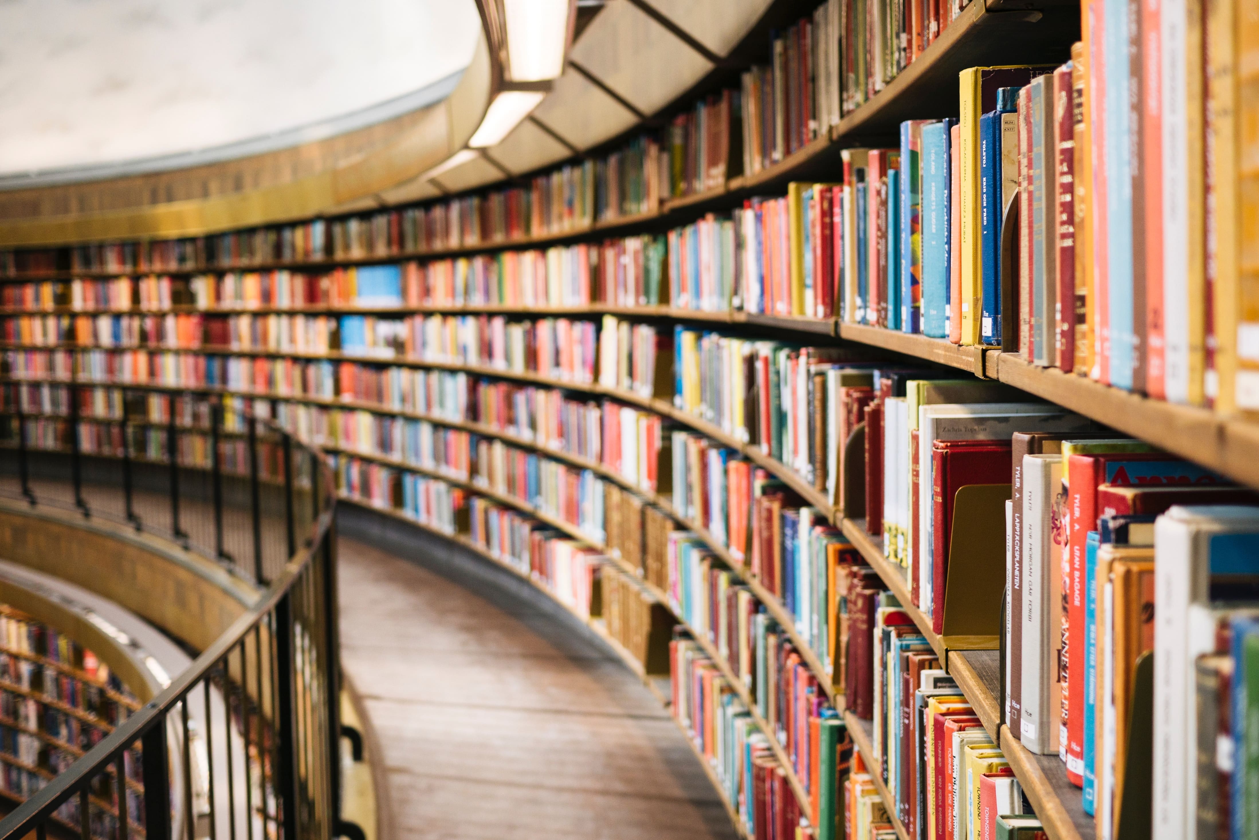 Image of a library with a long circular shelf