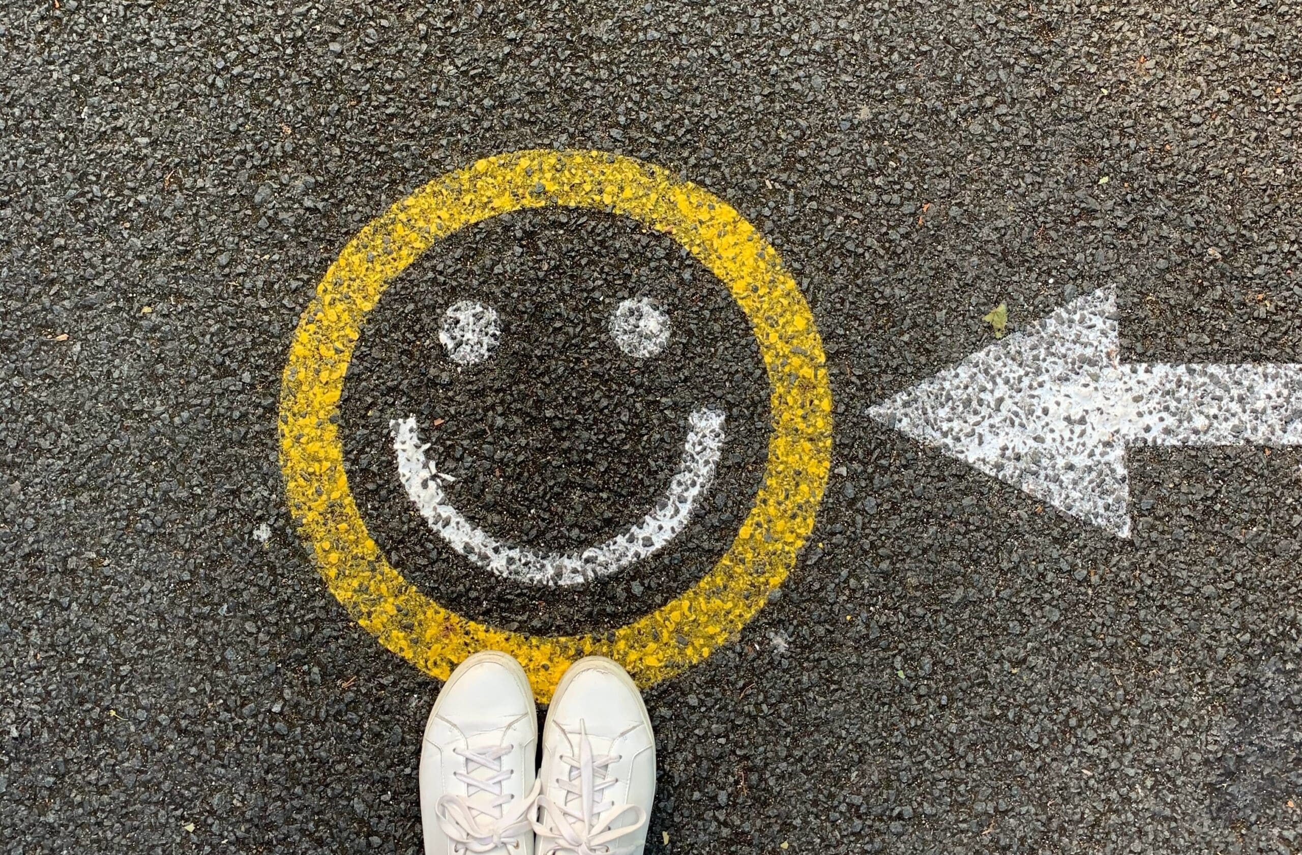 Smiley face icon on the street