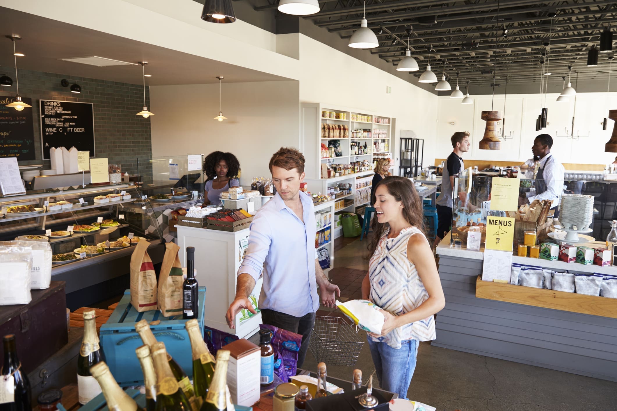 Interior Of Busy Delicatessen With Customers